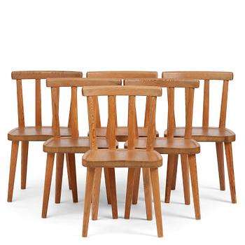391. Axel Einar Hjorth, a set of six stained pine "Utö" chairs, Nordiska Kompaniet, Sweden, 1930s.