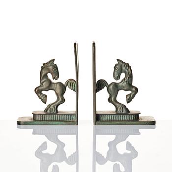 Carl-Einar Borgström, a pair of patinated bronze bookends, Ystad Brons, 1930-40s.