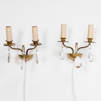 Four of mid-20th century wall sconces.