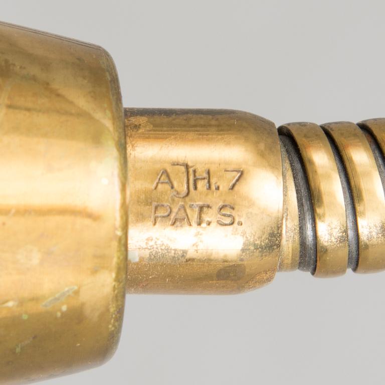 A mid 20th century floor lamp, marked AJH.7.