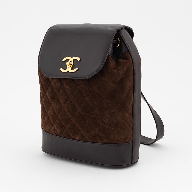 Chanel, a brown suede and leather one strap backpack/sholder bag, 1991-1994.