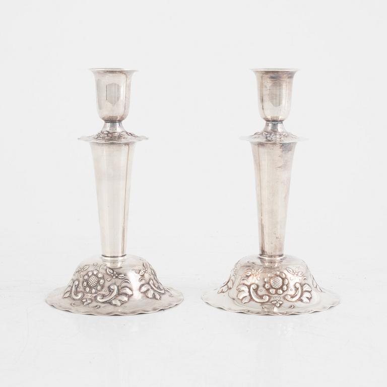 A pair of Swedish silver candlesticks, mark of GAB, Stockholm 1958.