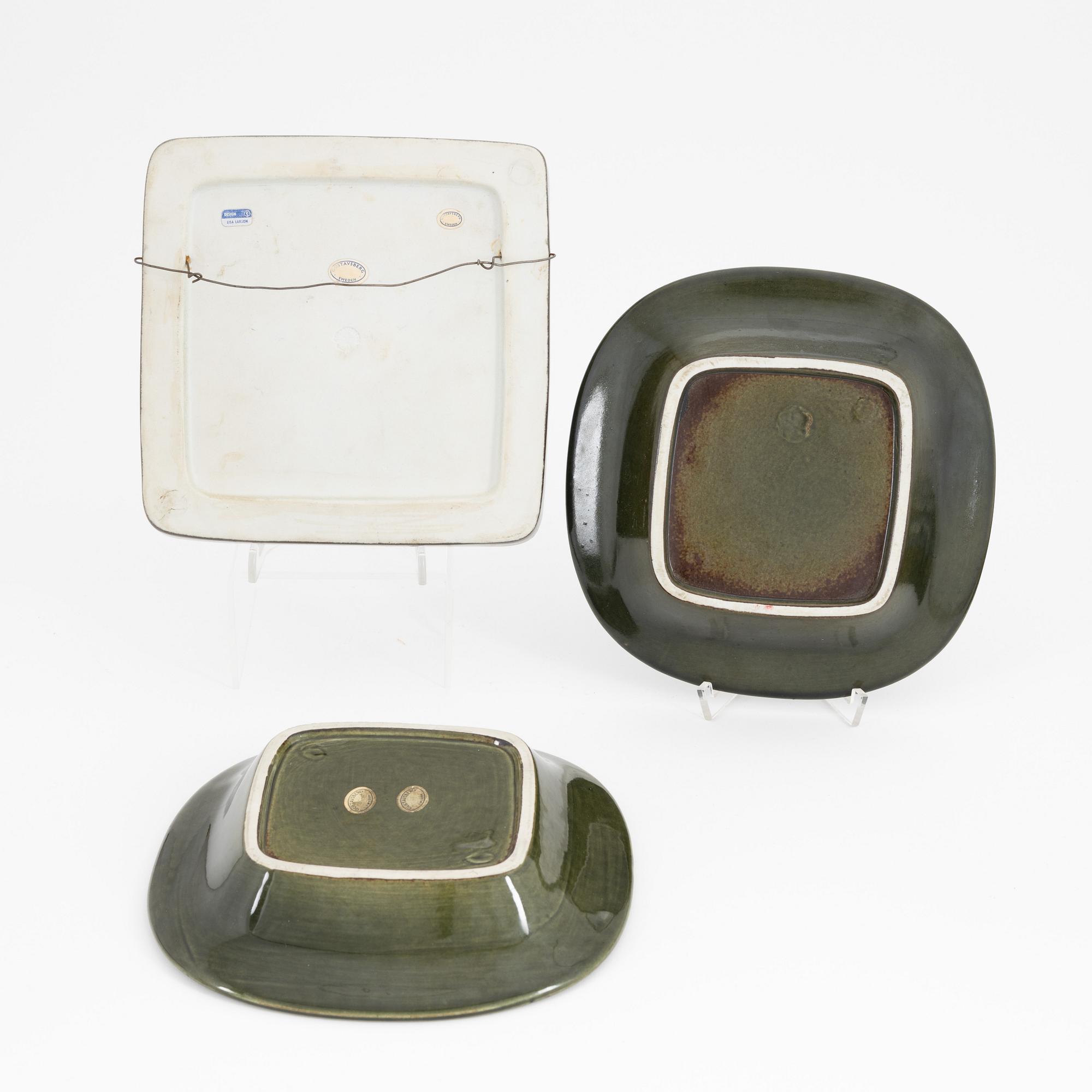 Lisa Larson, a group of three stoneware wall reliefs and two ashtrays, Gustavsberg.