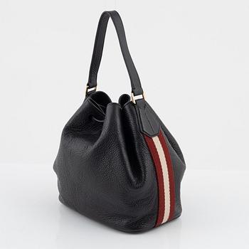 Bally, a black leather bucket bag.