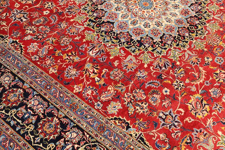 A Kashmar carpet, approx. 387 x 297 cm.