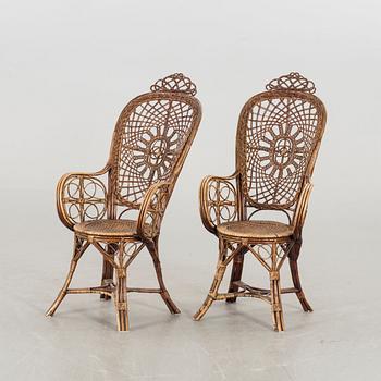 A pair of rattan chairs, early 20th century.