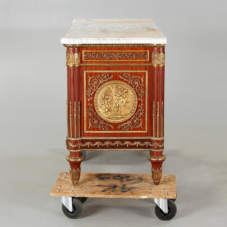 A Louis XVI style chest of drawers, second half of the 20th century.