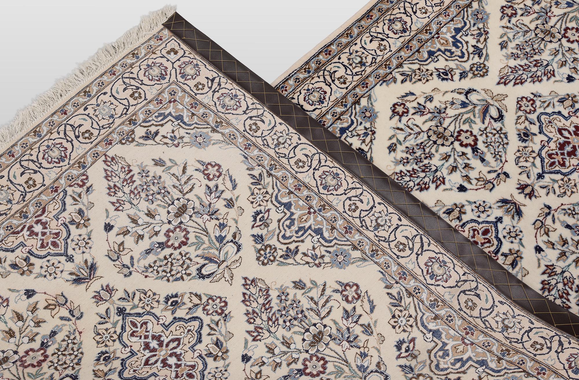 A Nain part silk carpet, 408 x 98 cm.