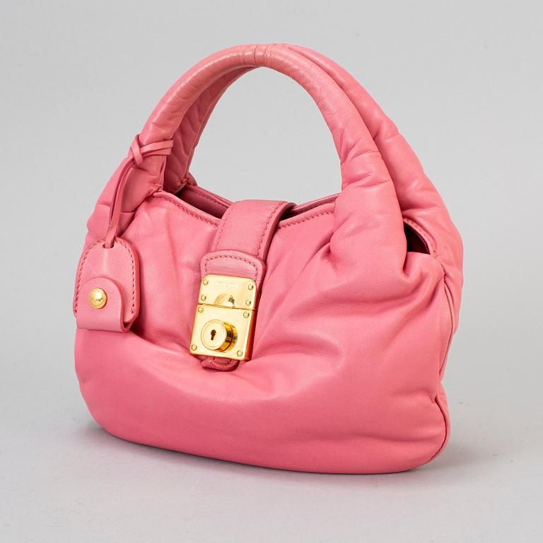 MIU MIU, a pink leather bag.