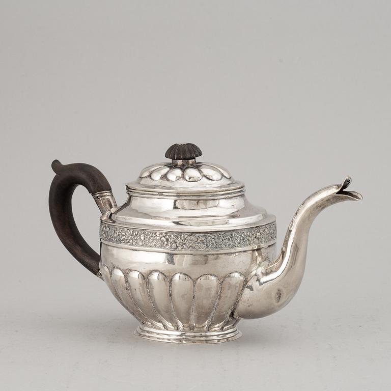 A Russian 19th century parcel-gilt silver tea-pot, marked Moscow 1833.