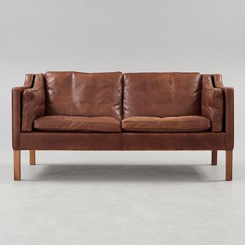 A Børge Mogensen two-seated dark brown leather sofa, Fredericia Stolefabrik, Denmark.