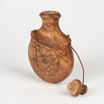 A birch flask by Erik Svonni, signed and dated 1975.