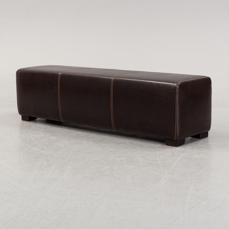 A leather-upholstered bench from Industria Divani e Poltrone, Italy.