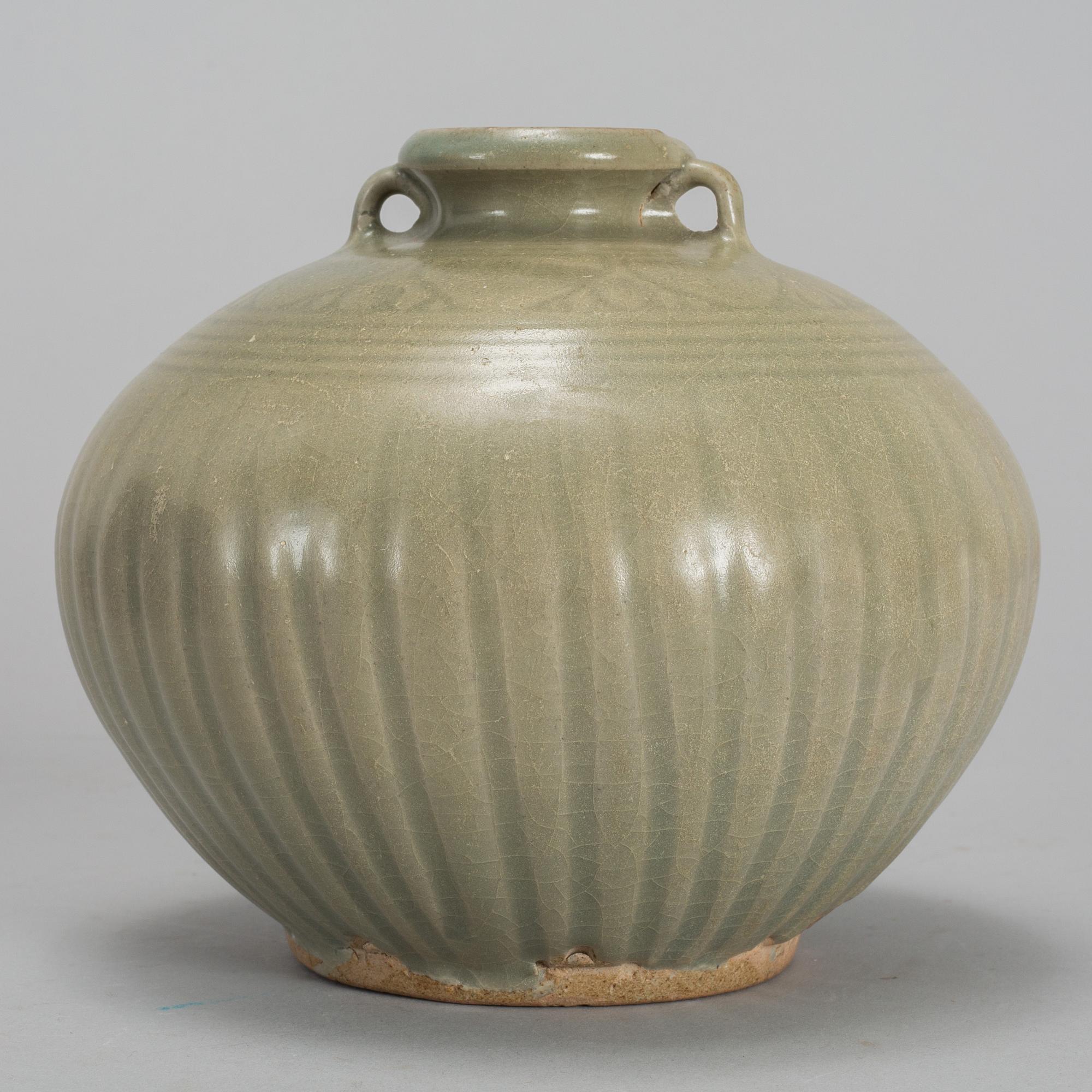 A cleadon glazed Sawnkhalok jar, South East Asia, 16th Century.