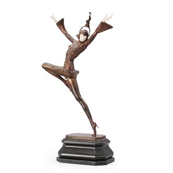 389. A Gustav Schmidt-Cassel gilt and cold painted bronze and ivory Art Deco figure of an 'Eastern dancer'.