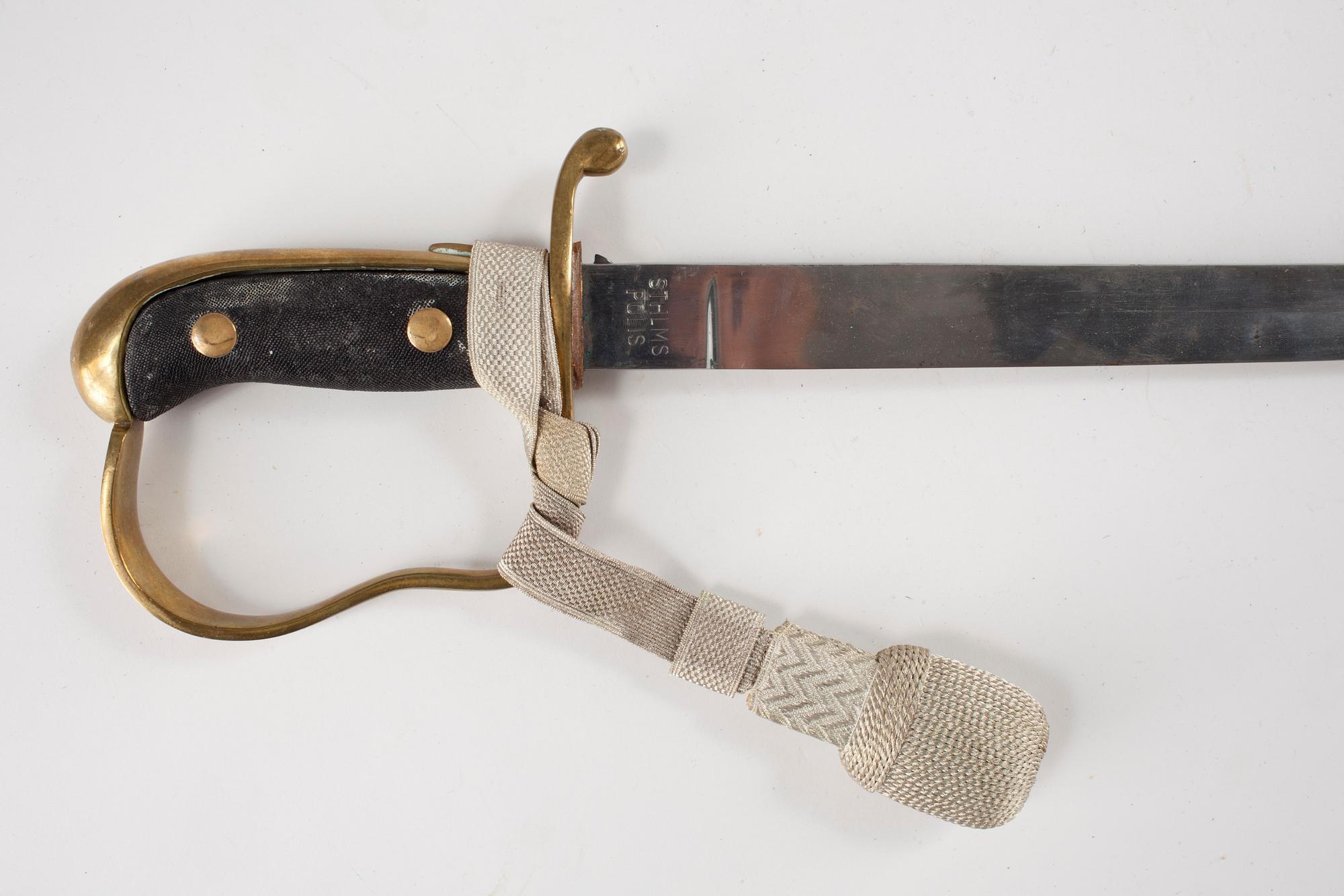 POLISSABEL, 1900-talets första hälft.