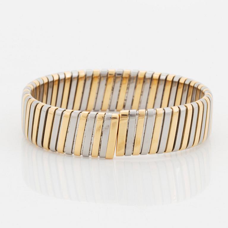 A Bulgari "Tubogas" bracelet in 18K gold and steel.