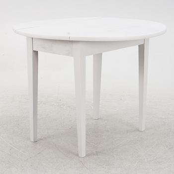 A drop-leaf table, early 20th Century.