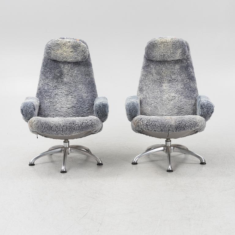 Alf Svensson, a pair of "Contourett Roto" easy chairs for Dux, Sweden.