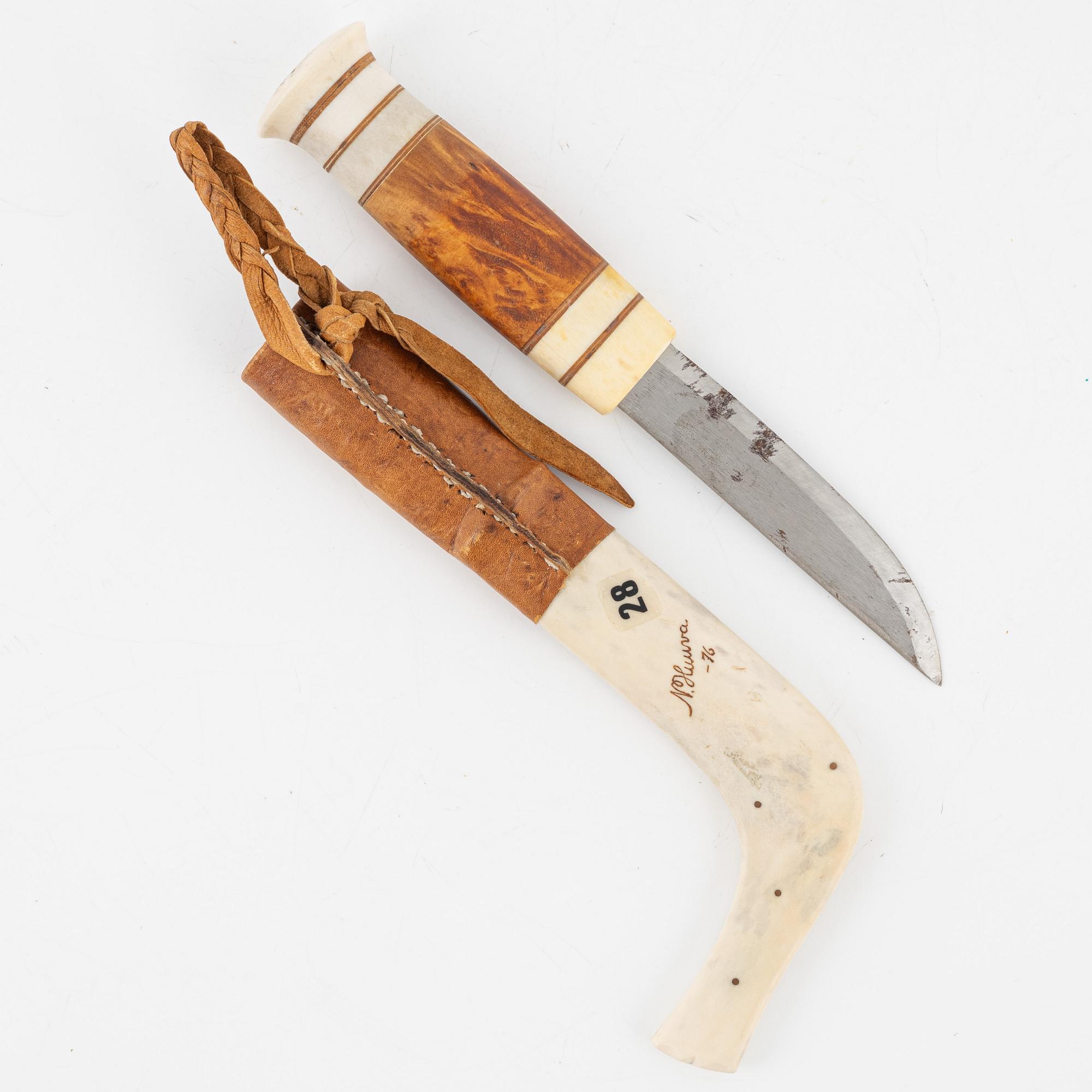 Nils Huuva, a reindeer horn knife, signed and dated -76.