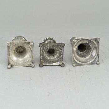 Three 19th century gustavian pewter candlesticks.