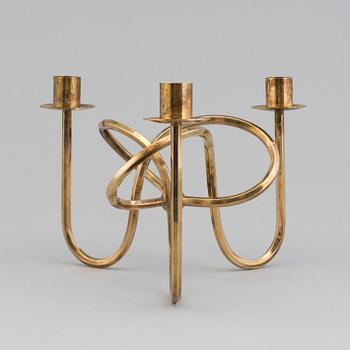 JOSEF FRANK, a brass candelabrum from Svenskt Tenn.
