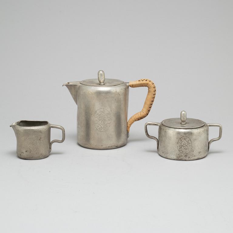 TAGE FOUGSTEDT, a 3 part pewter coffee service, signed and dated 1922.