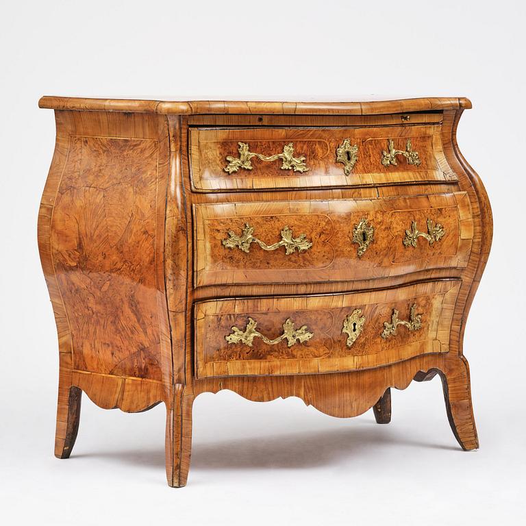 A burr alder parquetry rococo commode, Mälardalen, Sweden, later part 18th century.