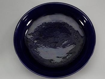 A pair of deep purple glazed dishes, Qing dynasty, with Qianlong six character mark.