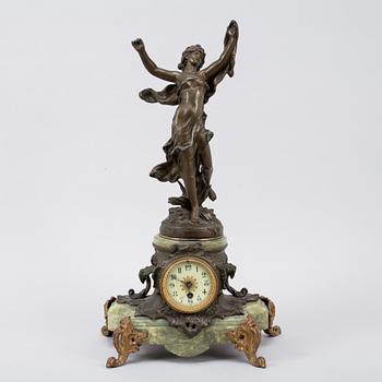 A bronze, green stone table clock, 'La Merveilleuse', after Auguste Moreau, 20th century.
