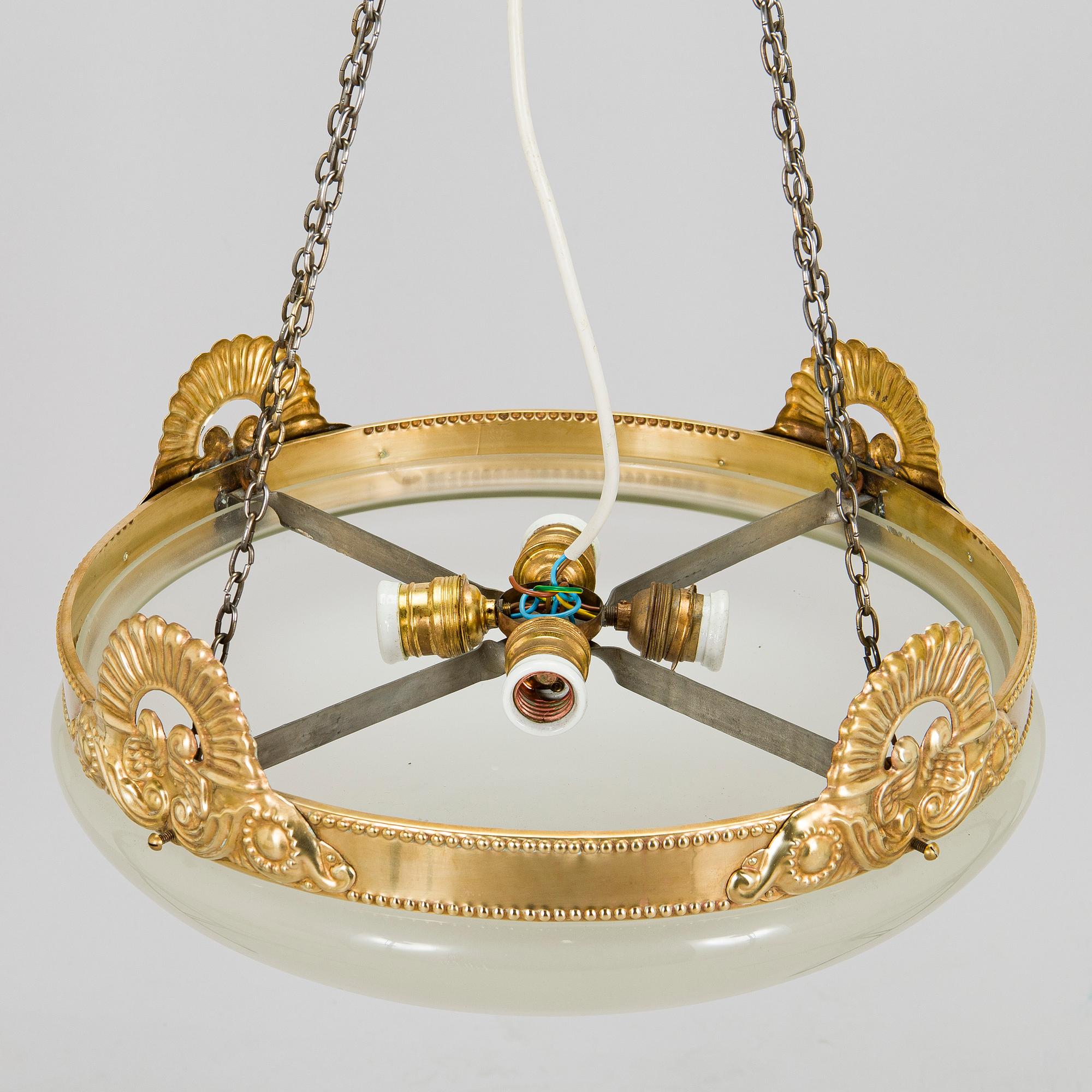 Kattovalaisin, 1900-luvun alku.