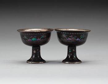 A pair of lacquer burgulate wine cups, Qing dynasty early 18th Century.