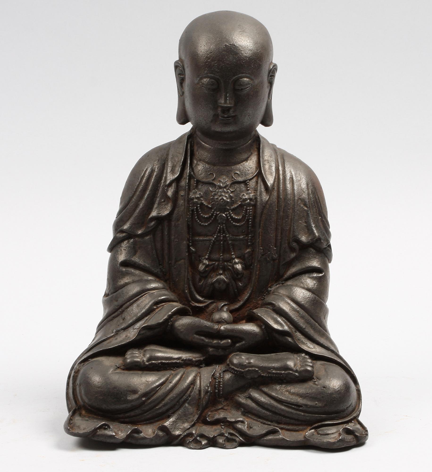 BUDDHAFIGUR, järn, orientalisk. 1900-tal.