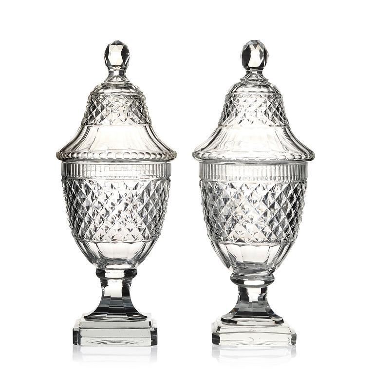 A set of two cut glass jars with covers, Anglo/Irish, 19th Century.