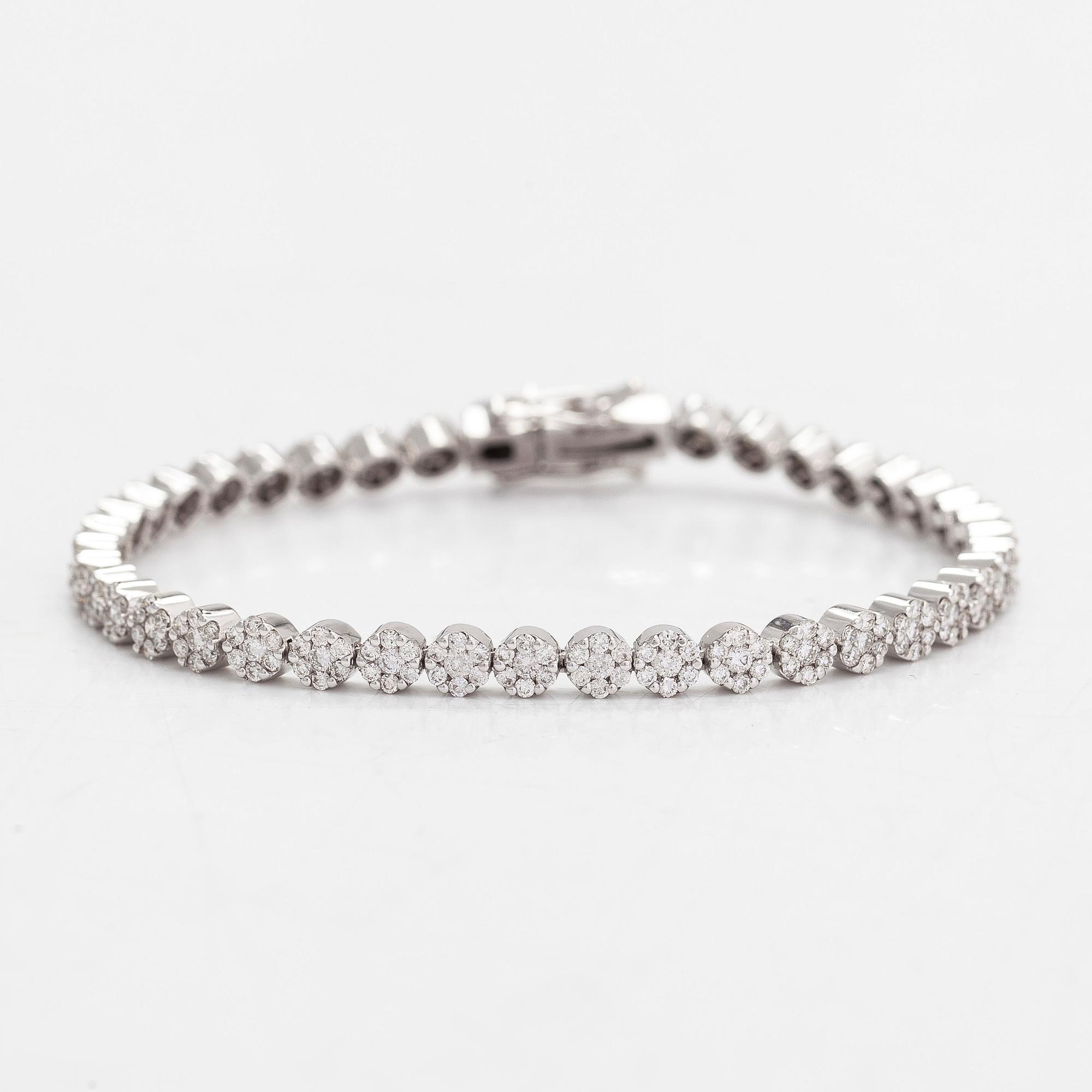 Tennisrannekoru, 18K valkokultaa, timantteja yht noin 3.44 ct. Suomalaiset leimat.