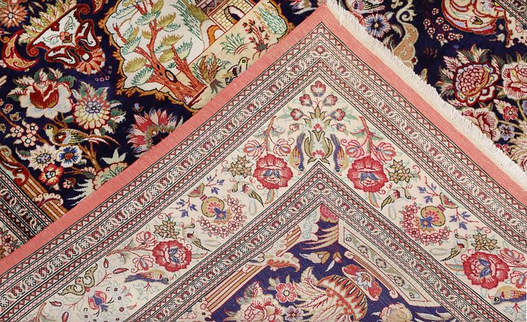 An older silk Ghom rug, 150 x 103 cm.