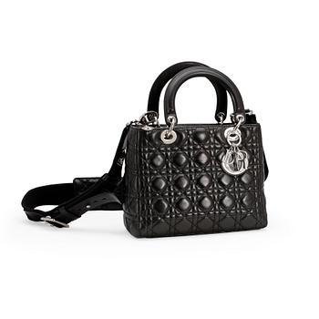 738. CHRISTIAN DIOR, a black leather "Lady Dior" bag.