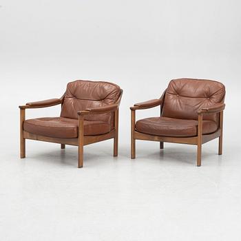 A pair of 1970's armchairs.
