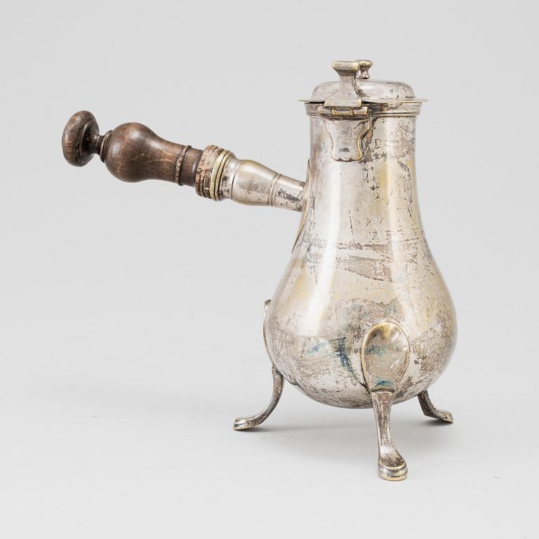 A 18th century chocolate pitcher.