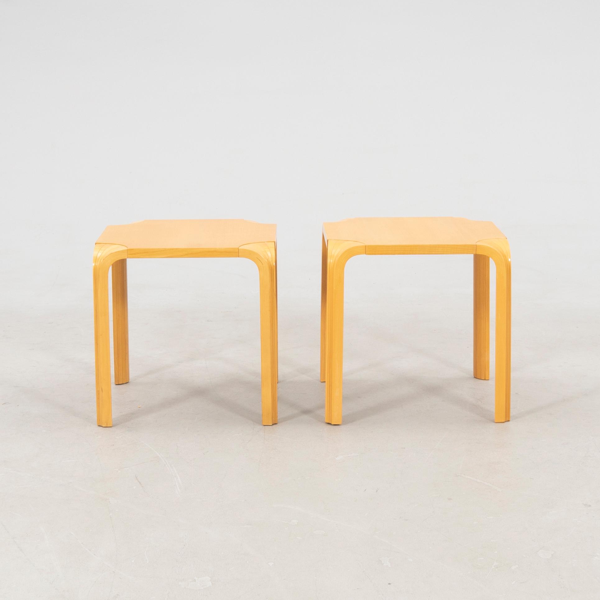 Alvar Aalto, stools/side tables, a pair model X601 Artek, latter half of the 20th century.