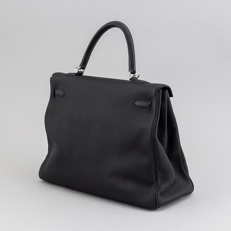 Hermès, a 'Kelly 35' black leather bag, 2017.