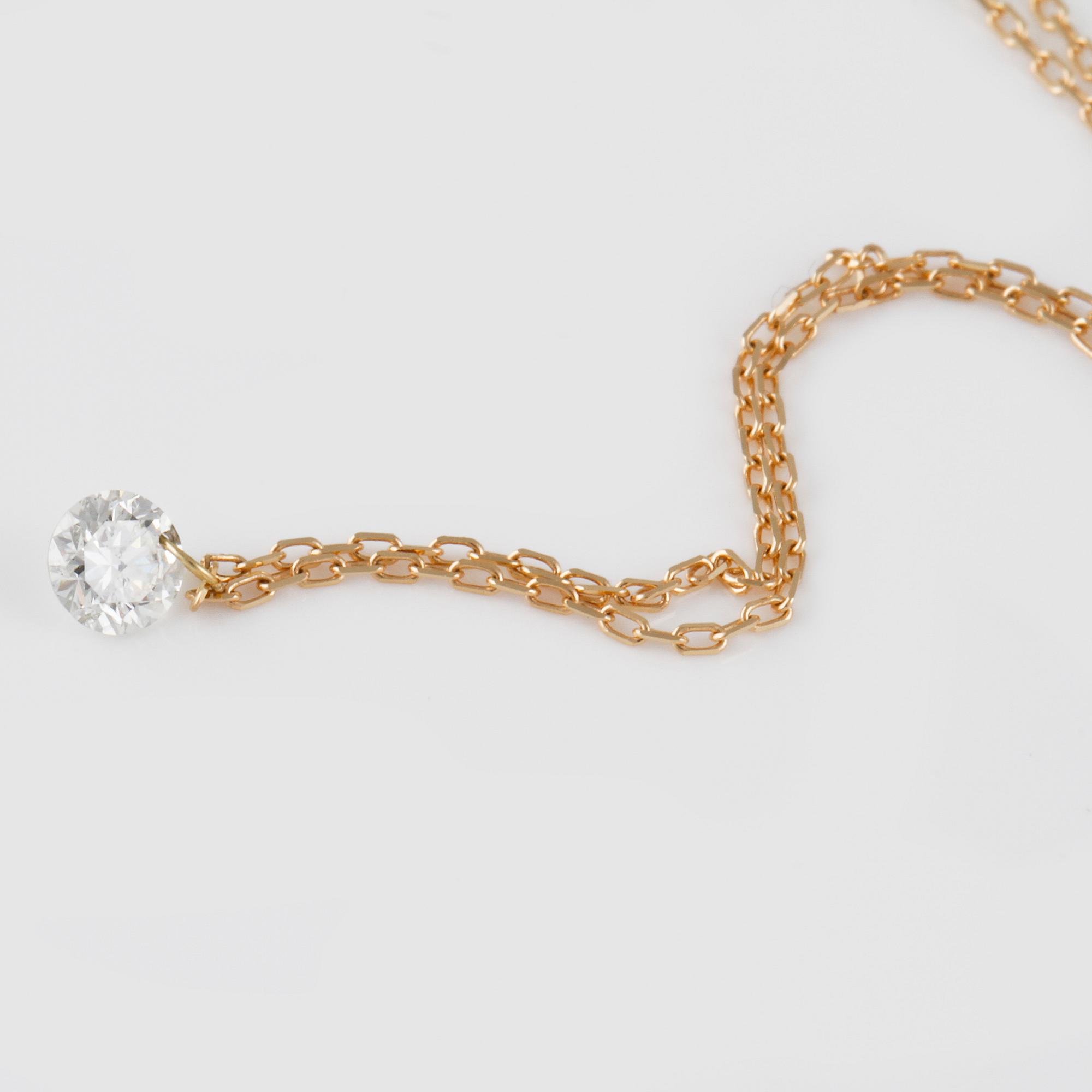 HÄNGE, 18K guld med briljantslipad diamant 0.20 ct. Vikt 1,0 gram.
