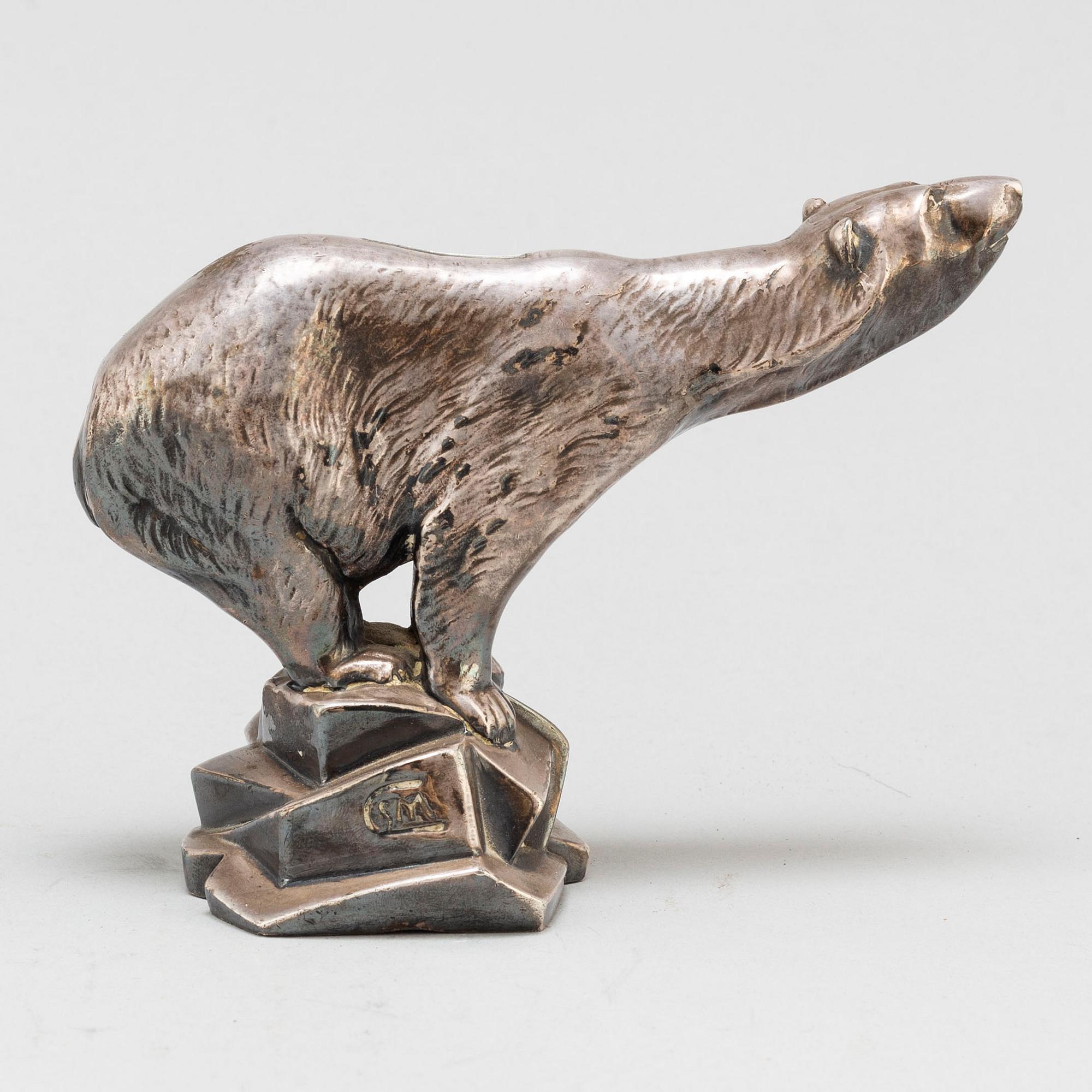 CHARLES SVEJSTRUP MADSEN, a silver plate paperweight.