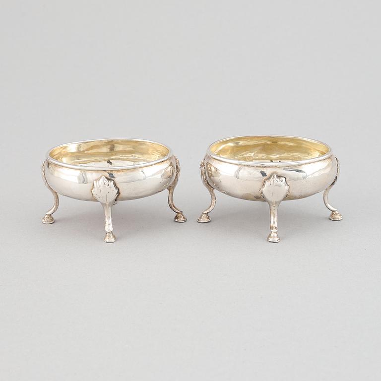 A pair of silver saltcellars, London, England.