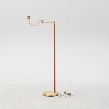 A brass floor lamp from EWÅ, second part of the 20th Century.