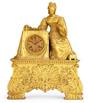 642. A French 1830/40's gilt bronze mantel clock.