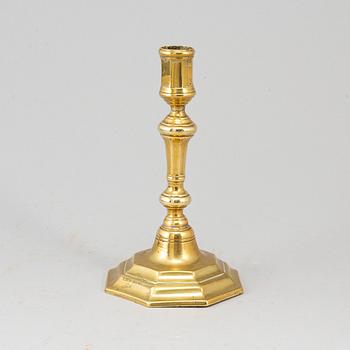 An 18th century bronze candlestick.