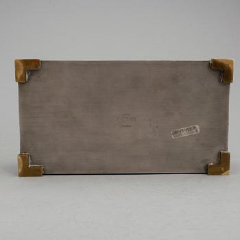 SKRIN, tenn och mässing, Herman Bergmans Konstgjuteri, Stockholm, 1940.