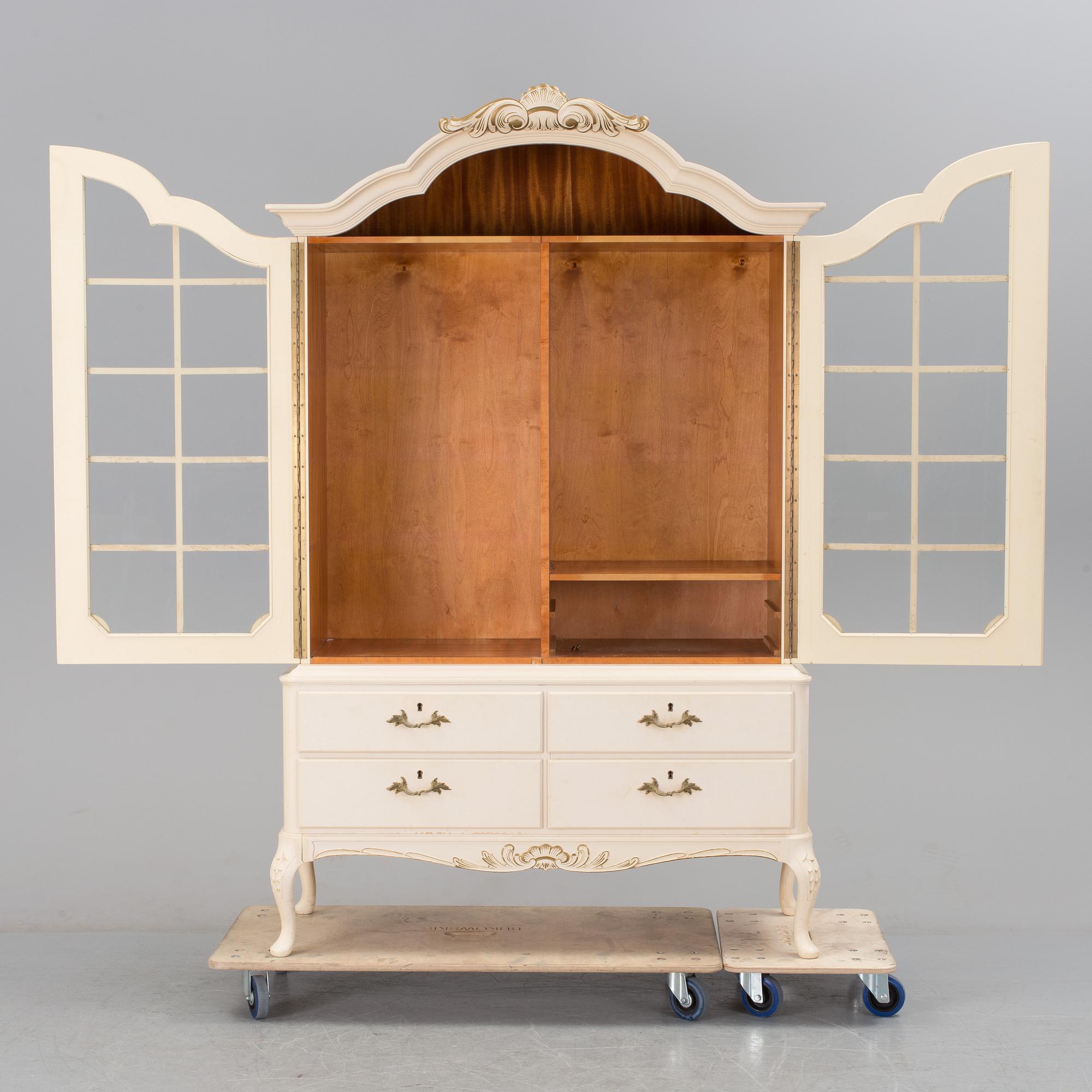 A mid 1900s cabinet by Oscar Edv Ekelunds Snickerifabriks AB, Virserum.