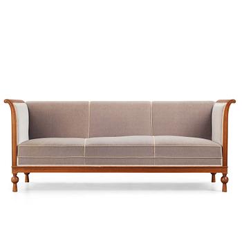 Swedish Grace, a mahogany sofa, reportedly a win in the Stockholm Cabinetmakers association lottery, 1920's.